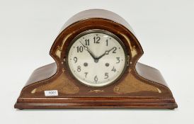 Early 20th century mahogany veneered mantel clock, the circular dial with arabic numerals, inlaid