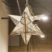 In the manner of Charles Edwards a gilt metal and glass hanging star lantern, 46cm high