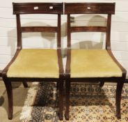 Pair of Regency mahogany bar back dining chairs with drop-in seats and front sabre legs, 87cm high x