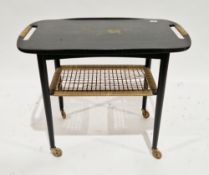 Mid-century Danish ebonised serving trolley, possibly by Johannes Andersen, the shaped top with