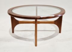 Mid-century Stonehill Stateroom teak and glass topped circular coffee table on four shaped legs