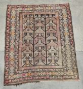 Eastern green ground rug with central geometric grid pattern, multiple geometric borders, 142cm x