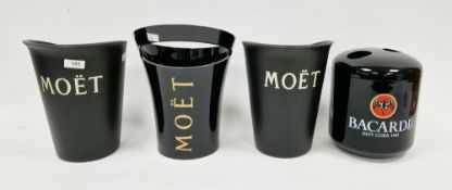 Three plastic Moet champagne ice buckets and a plastic Bacardi rum ice bucket, tallest 30cm high (4)
