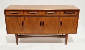 Mid-century G-Plan Fresco teak sideboard comprising three drawers, the central drawer with fitted