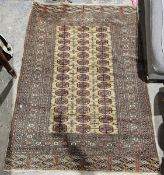Eastern green ground rug with three rows of 14 elephant foot guls and two rows of 13 geometric