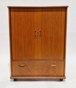 Mid-century teak media unit by G-Plan, comprising two panel doors opening to media unit space and