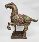 Contemporary Tang-style wooden carved and polychrome painted horse, enriched in gilding 80cm high