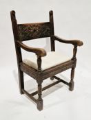 Late 19th/early 20th century oak gothic revival elbow chair by Liberty of London, with strapwork