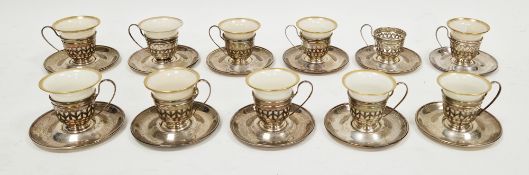 Part set of 11 Lenox porcelain gilt rimmed coffee cups with openwork silver holders (one porcelain