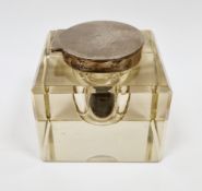 Square clear glass inkwell with faceted corners having a matched silver hinged inkwell lid bearing a