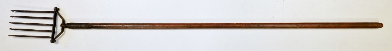 18th or 19th century iron five-prong salmon spear on long turned wooden handle, 145cm long
