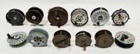 Collection of twelve fishing reels including three brass reels, two bakelite reels, J W Young '
