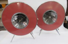 Pair of mid-century Spacemaster electric heaters of flying saucer form with a white and red finish