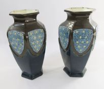 A pair of Eichwald Secessionist pottery vases, shouldered, panelled and tapering with stylised