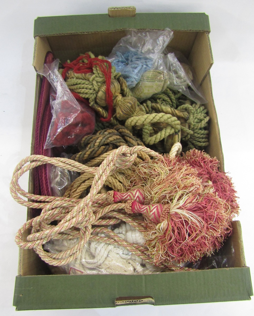 One box of curtain ties and tassels, in sizes, including burgundy damask silk tie-backs, an early