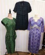 1950's green and gold brocade cocktail dress, a 1950's purple lace over cream satin cocktail dress