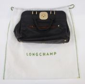 Longchamp Gatsby handbag in black embossed leather, with leopard print lining, label to interior