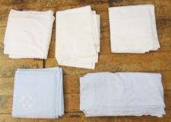 Five embroidered cotton double sheets (three white and two pale blue), floral decorated, each with a