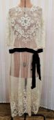 An Edwardian lace and embroidered net evening dress, black velvet belt attached to the drop waist,