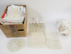 Quantity of miscellaneous household linen to include crochet bordered, embroidered, printed