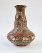 A studio pottery vase with multi-coloured glaze, indistinctly signed to base, 20cm high Condition