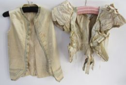 A mid-Victorian bodice with the original stays, hook and eye fastening, cream satin, cream