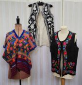 Assorted ethnic patterned style jackets to include a poncho, a wool waistcoat with embroidery, a