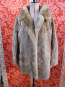 Mink three-quarter length coat, bell sleeves, embroidered lining, with a mink hat, a white coney