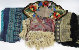 Printed wool paisley shawl (with holes), machine embroidered red wool tasselled shawl and three