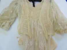 Various Edwardian lace blouses, one to include leg' o' mutton sleeves, a silk embroidered insert