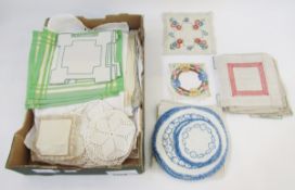 Large quantity of embroidered, crocheted and other table mats, tray cloths, table cloths and other