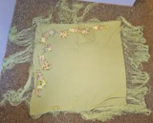 MId-century green shawl, hand embroidered in wool depicting various garden flowers, deep fringe,