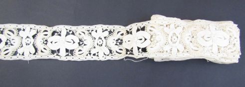 Length of lace, probably needlepoint, stylised floral design, approx. 10m long x 8cm deep