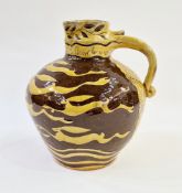 Jeremy Jones (contemporary) A terracotta jug 'The Names of the Hare' with slip glaze decoration of