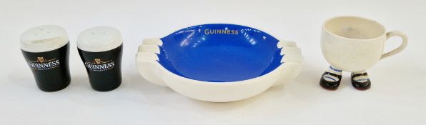A Carlton Ware Guinness ashtray, Guinness salt and pepper shakers, and a Carlton ware mug
