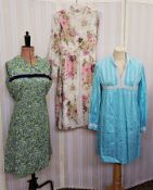 12 various 1970's and later dresses to include a sleeveless cotton shift, blue paisley-style printed