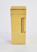 Alfred Dunhill, a mid 20th century Dunhill Rollagas pocket lighter, gold plated with engine turned