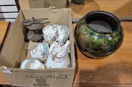 Unusual wrought iron candle holder comprising pair of pliers/scissors attached at top, a two-tier