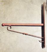 Red painted metal wall-mounting bracket