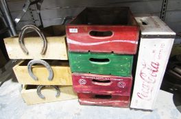Three wooden metal banded crates decorated with Coca Cola branding and two more one Dr Pepper and