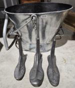 Vintage metal bucket and a small quantity of cast iron shoelasts