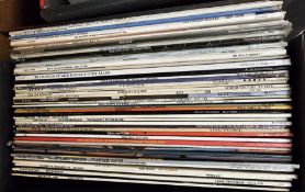 Two record cases containing nearly 100 vinyl LPs, mainly jazz to include The Clare Fischer Big Band,