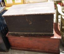Two antique pine chests both with candle box and iron drop handles, one stained red, the other