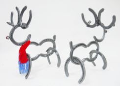 Five reindeer ornaments constructed from horseshoes, one with a knitted scarf (5)