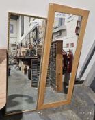 Two mirrors, one pine framed, the other with gilt and cream painted frame, both tall rectangular (2)