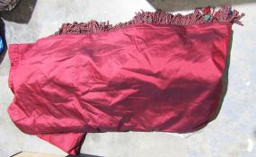 Single red curtain fringed to two edges, lined to interior, 225cm wide x 3m high  Condition Report