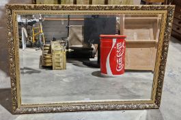 20th century giltwood rectangular wall mirror, with bevelled glass, the border with leaves and