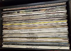 Three record cases containing approximately 130 mainly jazz vinyl LPs, including Humphrey