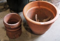 Large terracotta pot and a terracotta chimney pot.