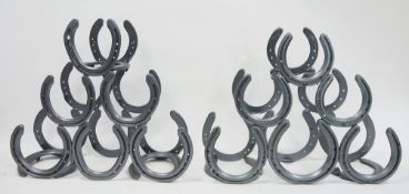 Two six-bottle pyramid wine racks constructed from horseshoes (2)